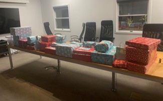 Wrapped gifts ready for DVPI families, Project North Pole